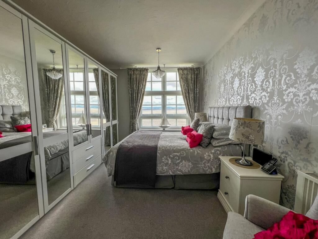 Spacious two-bedroom apartment in Fedden Village, Portishead, featuring modern interiors, stunning views, and access to top-notch amenities.