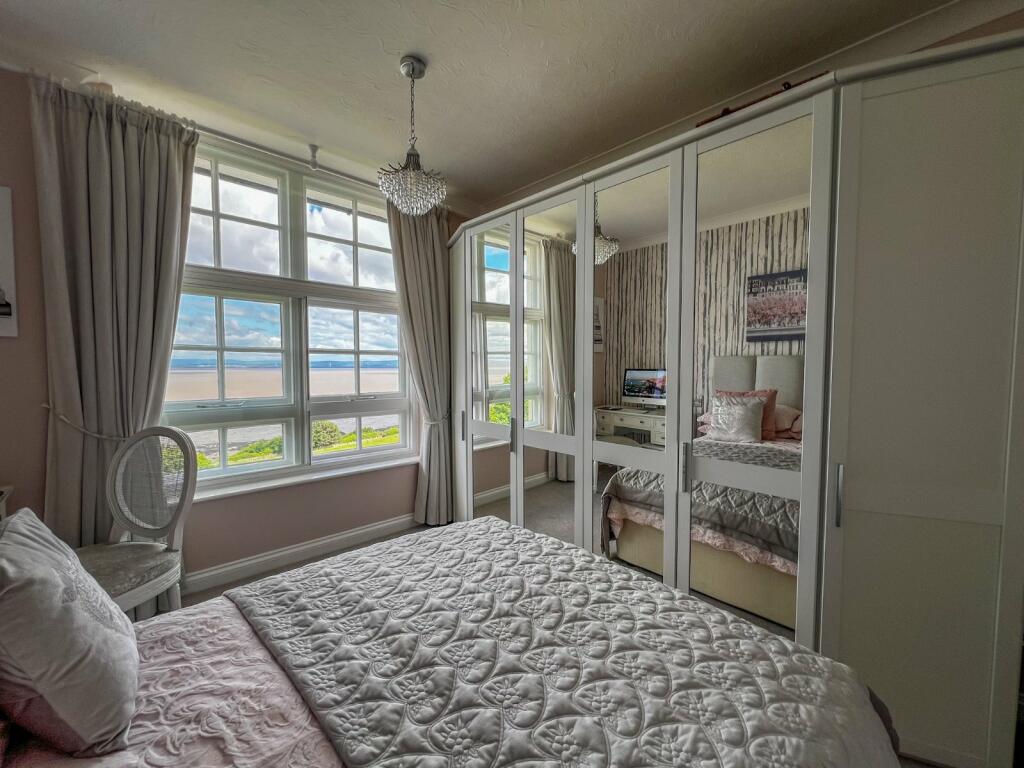 Spacious two-bedroom apartment in Fedden Village, Portishead, featuring modern interiors, stunning views, and access to top-notch amenities.